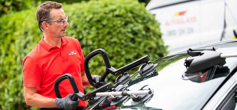 Our technician carrying out a windscreen replacement